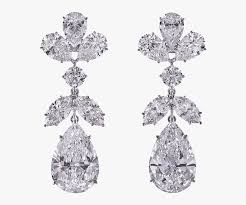 While they are crafted in 18kt gold, the sprinkle of 0.5096kt diamonds on the curvilinear patterns makes this diamond studs even more enchanting. Fancy Diamond Earrings Png Transparent Png Transparent Png Image Pngitem