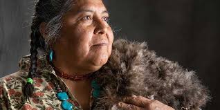 DCA archeologist weaves a blanket made of 17,000 turkey feathers