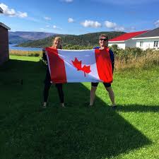 Oh Canada Waving The Flag From Glorious Norris Point Newfoundland On The First Leg Of Our Cross Canada Paddle Boarding Advent Road Trip Explore Canada Norris