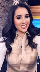 In today's fashion... Royale Da in a sleek black wraparound dress. On the  other hand, you have me. I could be several things today. A zookeeper,  cargo pants turned into a dress,