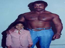 The show stars johnson and other actors playing younger versions of the actor. Just A Young Dwayne Johnson Rocking A Pink Suit Next To His Dad The Independent The Independent
