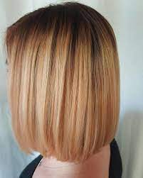 A Strawberry Blonde With Darker Roots Strawberry Blonde Hair Color Strawberry Blonde Hair Dark Roots Blonde Hair