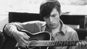 A Young David Gilmour And A Acoustic Guitar David Gilmour David Gilmour Pink Floyd Pink Floyd
