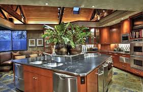 Dream gourmet luxury kitchen house plans & blueprints. Contemporary Kitchen With Large Island Packed With Stainless Steel Appliances Gourmet Kitchen Design Kitchen Design Contemporary Kitchen