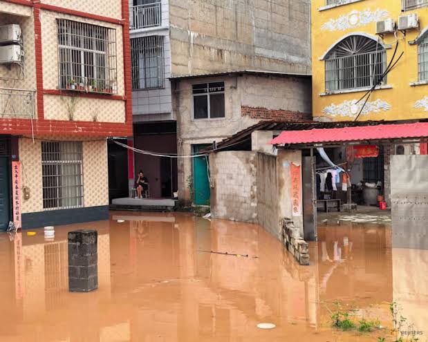 Flooding from Typhoon Narra submerges homes in southern China, forcing 54,000 to relocate as heavy rain persists in Vietnam