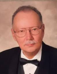 Elmer W. Travis Obituary