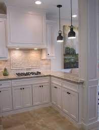 Christy, your blog is extremely well done. White Cabinets Stone Backsplash 2021 Antique White Kitchen Beige Kitchen Off White Kitchens