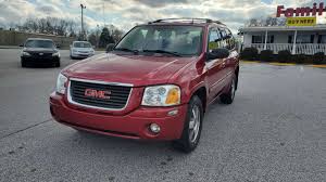 Image result for Red 2003 Envoy
