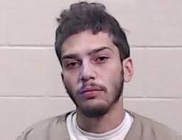 Man charged in hit and run that sent motorcyclist to hospital