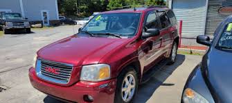 Image result for Red 2003 Envoy