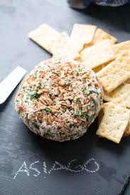 Roasted Garlic Asiago Cheese Ball Lemons For Lulu Food And Recipe Blog Asiago Cheese Cheese Ball Recipes Cheese Ball