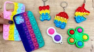 Pop it toys and games are similar to fidget spinners and other types of sensory toys that are used to relieve stress or alleviate the symptoms of conditions including adhd and autism. 30 Cesit Yeni Pop It Pop It Telefon Kilifi Pop It Fidget Collection Youtube