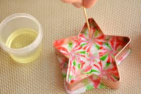 I found the free printables for these candy bar wrappers here. Melted Peppermint Candy Ornaments Christmas Candy Ornaments