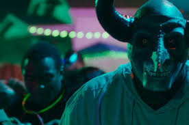 The First Purge review: the franchise becomes full-on social horror | Vox