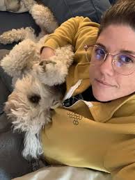 Thank you for letting me join, this was my little Schnauzer, Penny. She was  with me for 16 years. When she was a baby trying to walk along the sofa  like her