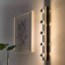 If you need a little more light, choose a mirror with integrated lighting to brighten things up. Musik Chrome Plated Wall Lamp Ikea