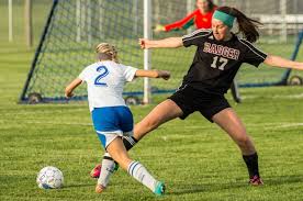 Badger boys win SLC track title