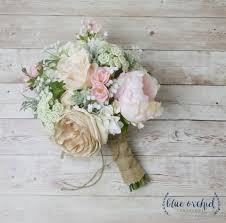 While color will play a major role in the 2021 wedding flower trends, couples are also going back to the basics for their bouquets, centerpieces, and other. This Boho Bouquet Has A Mix Of Peonies And Wildflowers This Silk Flower Bouquet Silk Flower Wedding Bouquet Flower Bouquet Wedding Artificial Wedding Bouquets