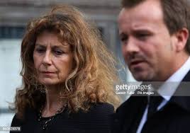 Karen Buck, accompanied by Detective Inspector Martin Brunning, reads...  News Photo
