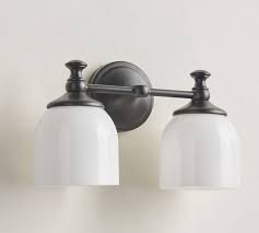 40 watts, type g (not included). Mercer Double Sconce Pottery Barn