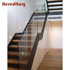 I designed, built and finished every wood stair railing and banister on this site. Elegant Frameless Glass Railing Solid Wood Stair Treads Wrought Iron Staircase Buy Wood Stairs Glass Stairs Price Wrought Iron Stair Design Product On Alibaba Com