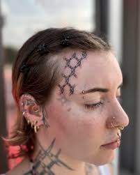 Image result for quirky pylon forehead tattoo