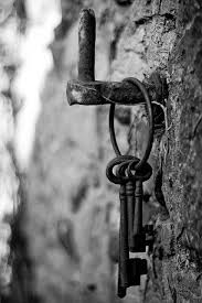 The woman turns the key in the lock on the outside door open. Pin On The Key To My Obsession