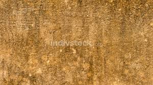 Seamless sand texture is used for 3d max visualization during the design of printing and electronic projects. Close Up Sand Wall Texture Pattern Beach Background Design Element Sandy Effects On Sandstone Plaster Pillar With Minor Cracks And Uneven Patches Highlighting Natural Yellow Color Shade Copy Space Indivstock