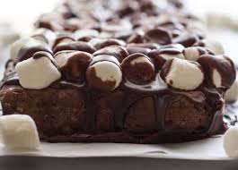 Next, just drop in your sugar, eggs, and vanilla and mix really well once again! Fudgy Marshmallow Brownie Cake