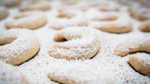 Traditional austrian christmas cookies linzer biscuits filled with apricot jam. Vanillekipferl The Austrian Crescent Shaped Biscuits