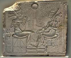 Portrait head of queen tiye with a crown of two feathers. Akhenaten Nefertiti Their Three Daughters Illustration World History Encyclopedia