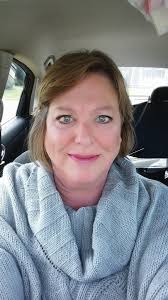 Can someone help edit a photo to remove the car from the background for an  obituary?