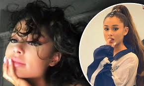 Golden brown is the most natural ariana grande's hair color that you can copy. Ariana Grande Reveals Her Natural Curly Hair And Leaves That Ponytail Behind While Self Isolating Daily Mail Online