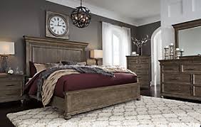 Traditional bedroom sets feature classic designs, such as decorative moulding and bedpost finials, to transport your imagination to an earlier era. Johnelle Queen Panel Bed Ashley Furniture Homestore