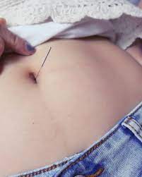 For a traditional belly button piercing, they'll mark the true center above your navel. Mengmeng Bellycool