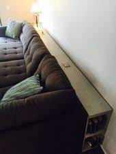 Behind The Couch Shelf With Electrical Outlets And Side Book Shelves Home Design Model Dress Sho Regal Hinter Der Couch Wohnzimmer Sofa Wohnen Und Leben