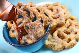 Mexican fritters topped with cinnamon and sugar. Delicious Traditional Mexican Dishes For Christmas