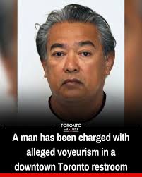 Police have charged Jay Braga, 62, following an alleged voyeurism incident  in a downtown Toronto washroom near Bay Street and Adelaide Street West