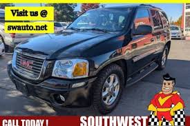 Image result for Medium Red 2002 Envoy