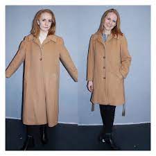 So we've narrowed down the only 15 worth investing in. Camel Coat Downsizing Rethink Tailoring