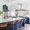 Kitchen island set that includes two stools rustic antique oak top, white base and black metal stools beveled detailing on countertop. 1