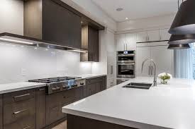 White shaker with sparkling white quartz? Quartz Vs Granite Which Is Best All About Stone Countertops