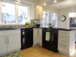 Kitchen Reveal One Project At A Time Diy Blog Black Appliances Kitchen Kitchen Cabinets With Black Appliances Black Kitchens