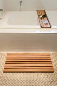 Wooden Bath Mat And Caddy There S Nothing More Uncomfortable Than Getting Out From Tub Or The Shower And Standing On A Diy Bath Mats Cedar Bath Mat Bath Tray