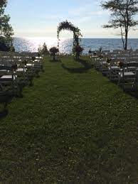 A Stunning Outdoor Water View Wedding Ceremony In Door County Wisconsin By Door County Event Wisconsin Wedding Wedding Photo Albums Wedding Officiant Script