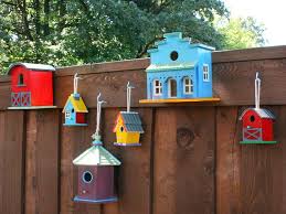 Decorate A Fence With Birdhouses Decorative Bird Houses Bird Houses Diy Fence Decor