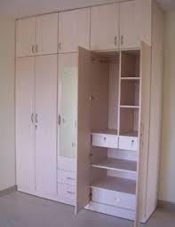 If you have a small bedroom, consider a sliding wardrobe to save space. South Indian Kitchen Interior Design Google Search Wardrobe Interior Design Bedroom Storage Cabinets Closet Decor