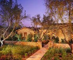 Tuscan Front Yard Landscaped Garden With Entry Walkway And Low Walls Tuscan Landscaping Tuscan Garden Tuscan Landscape Design