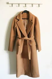 The voluminous silhouette looks cool and slouchy when unbelted. Pin On New Closet Essentials