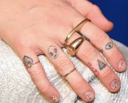 On her right hand alone she has 9 tattoos, though they are all tiny. Best Miley Cyrus Fan Tattoos Nsf Music Magazine